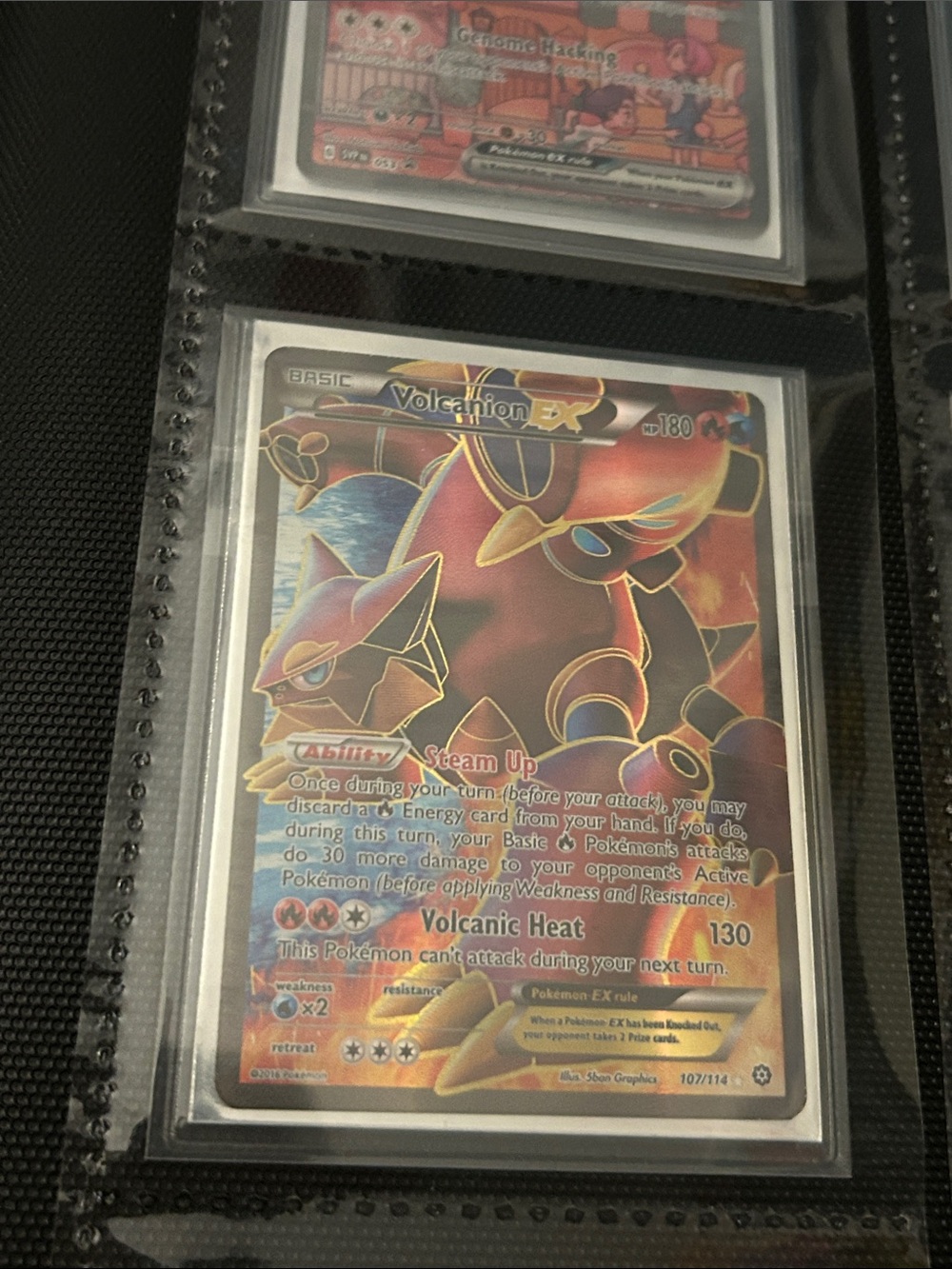 Pokemon Volcanion-EX Holo Card with Red and Gold Accents